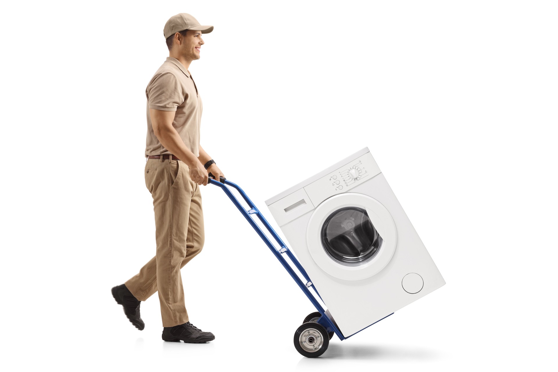 Delivery man pushing a hand truck loaded with a washing machine