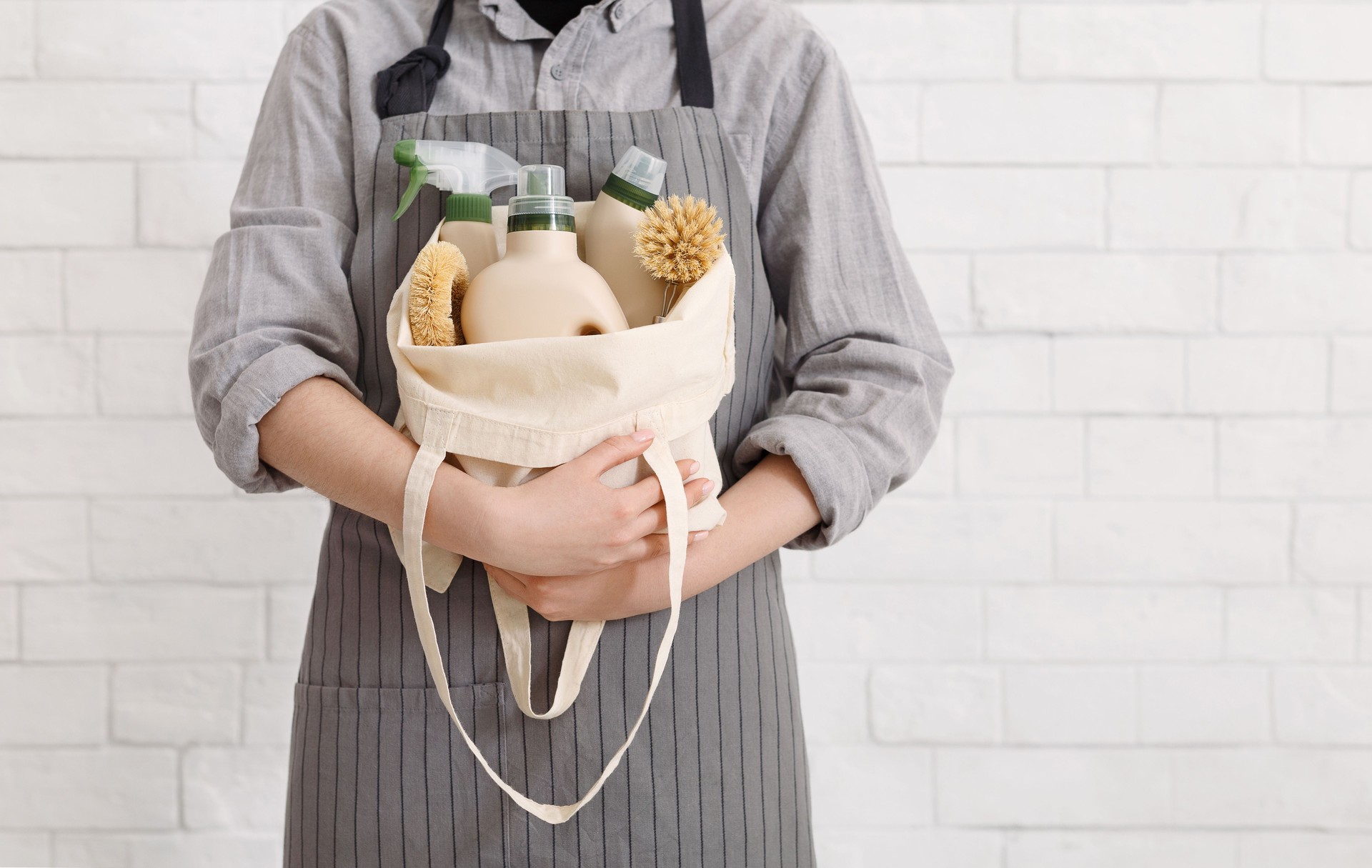 Unrecognizable woman holding Eco friendly products for home cleaning