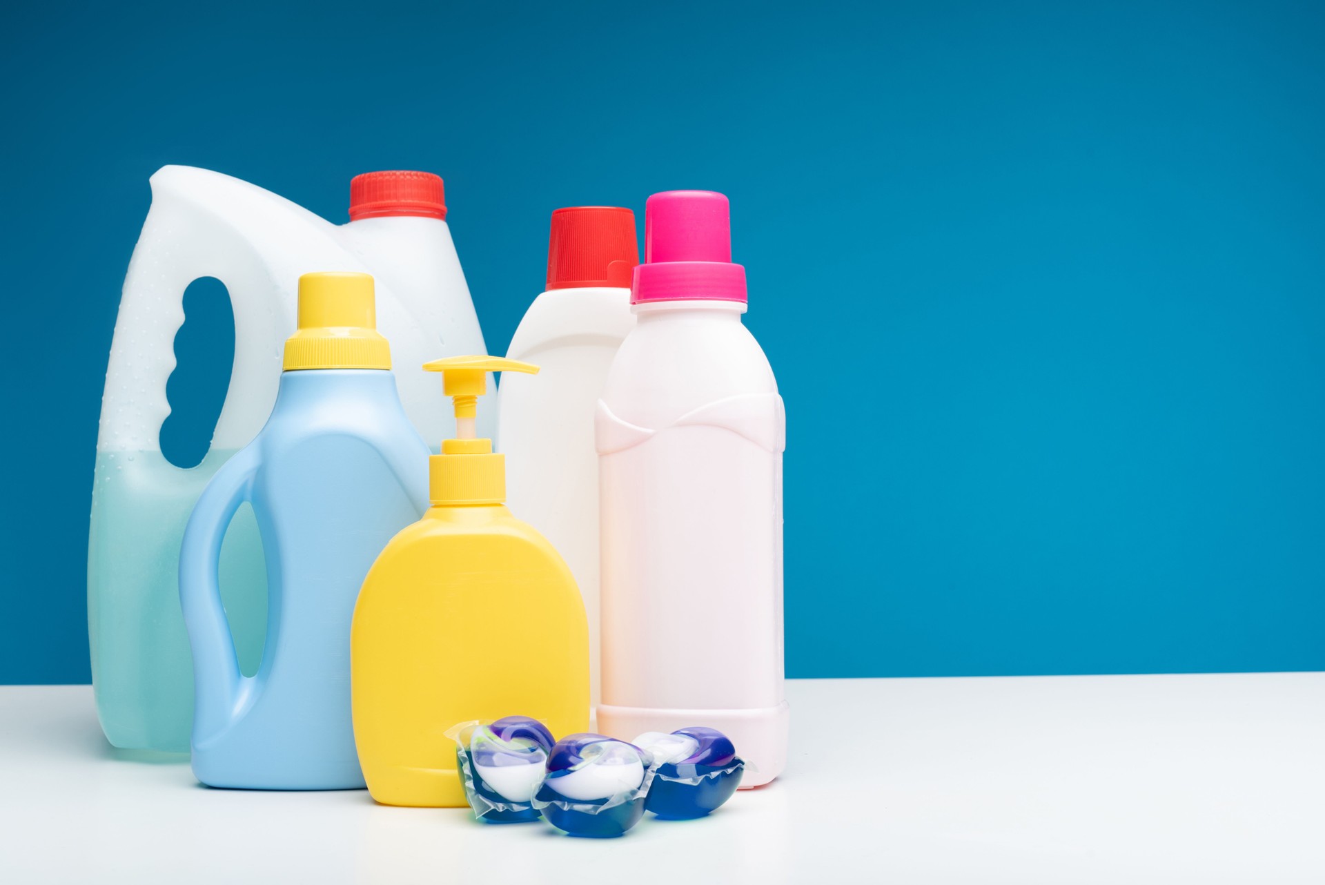 Various detergents put on white table